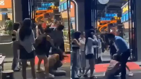 原配当街暴打小三